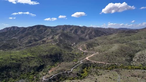 Aerial view of winding road through mountains, United States.