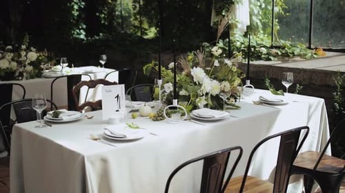 Beautiful Wedding Tablescape with White Flowers and Black Candles