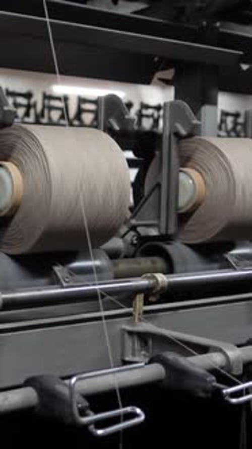 Close Up of Spools of Thread on Machine