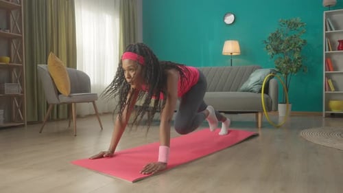 A Woman Goes in for Sports Mountain Climber Runs in an Emphasis Lying Down A Woman Shakes the