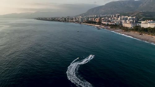 Sports Boat Sails and Makes Beautiful Turns Aerial View 4 K