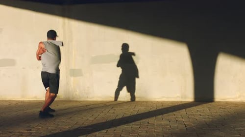 Man Breakdancing, Shadow Dancing at Sunset