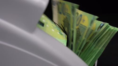 Euro Bills Run Through Money Counting Machine