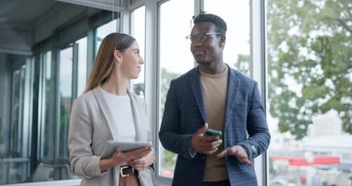 Business people, walking and talking with a technology in an office with ideas, smile and strategy