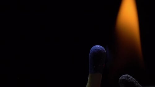 View of a Match Igniting in Slow Motion for Dramatic Effect