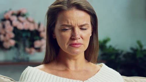 Distressed Woman Crying with Tears Streaming Down Face