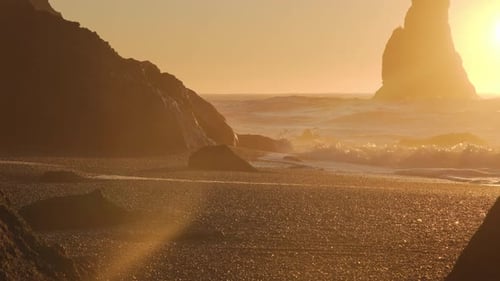 Black Sand Beach In Iceland Sunset Over Volcanic Cliffside North Atlantic Ocean Water Vik Shot in 8K