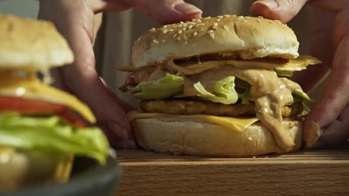 Close Up of Hamburger Being Assembled