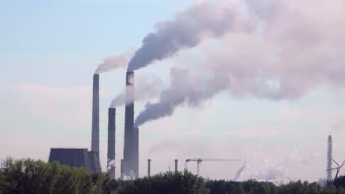 Smoking chimneys of a large factory