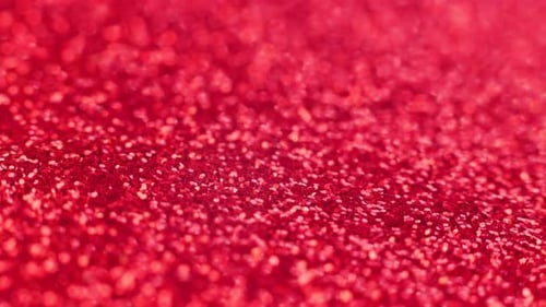 Papel pintado rojo con purpurina brillante en movimiento, perfecto para Navidad, Año Nuevo o cualquier otro fondo festivo