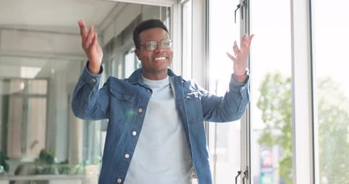 Creative black man, smile and throwing papers in celebration, victory or accomplishment walking