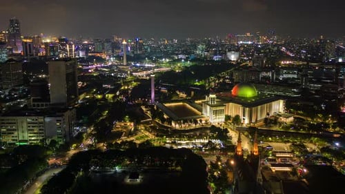 Timelapse of Jakarta City Skyline with Istiqlal Mosque and Jakarta Cathedral