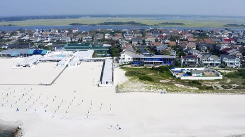 Panning left along the white sands of Long Beach in Long Island