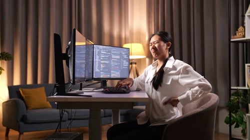 Asian Woman Programmer Having A Backache While Creating Software Engineer Developing App, Program