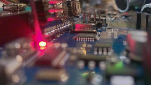 Many arduino microchips and sensor, with led flashing.