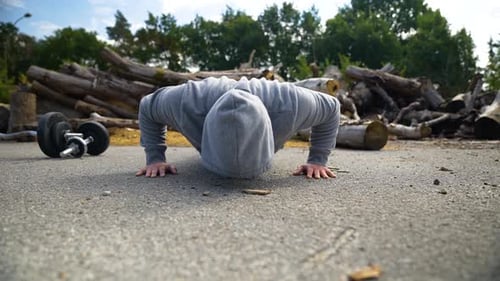 Man Doing Push Ups in Urban Environment