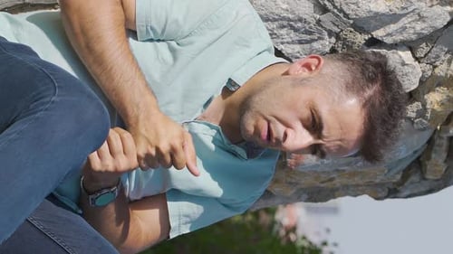 Vertical Video of Man with panic attack problem.