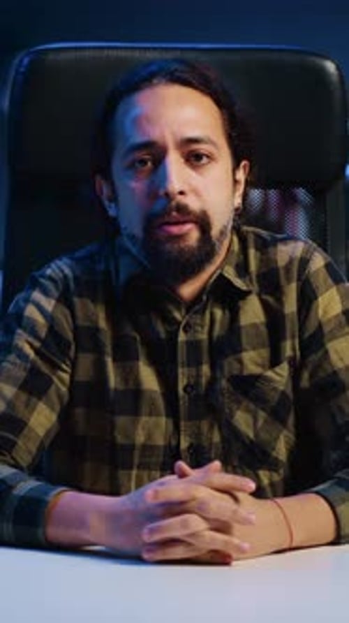 Vertical Video POV of Influencer Filming Himself in Home Studio Doing Daily Vlog