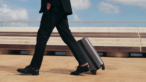 Tourist Man with Suitcase Baggage in Spain A Traveler with Luggage Suit Jacket on Business Street Go