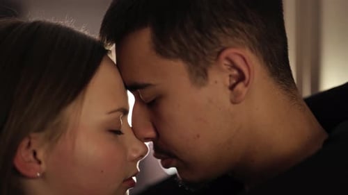 Loving Couple Foreheads Touching in Close-Up Shot