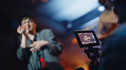 Musical Band Performing Bar Stage Recorded By Professional Videographer Closeup