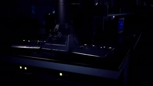 Futuristic Microscope in a Dark Scientific Lab