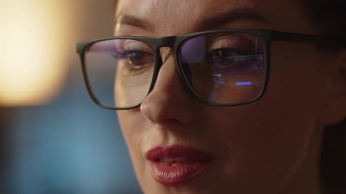 Close Up Shot of Nervous Business Lady Control the Stocks Market Updates in Eyeglasses Reflection