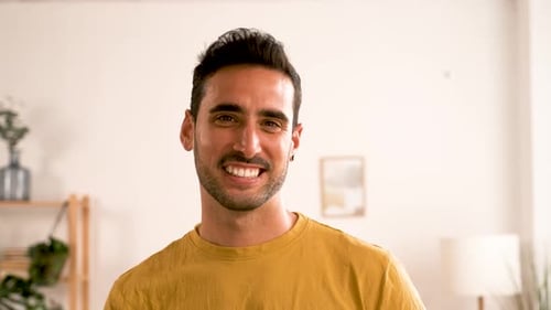 Attractive Young Adult Man Smiling Indoors