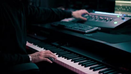 Close Up in the Recording Room Dark Studio Sound Engineer While Playing Records the Sound of