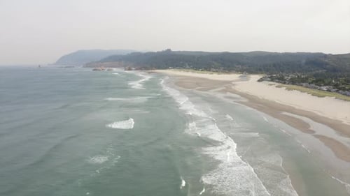 4k drone of canon beach oregon. PNW beach aerial shot.
