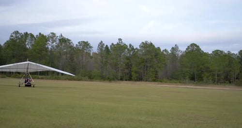 Hang Gliding Couple Landing in Orlando Slow Motion