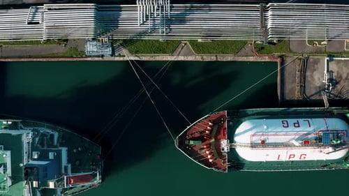 Aerial Top Down View Ship LPG Tankers Vessel Loading in Gas and Oil Terminal Station Refinery Global
