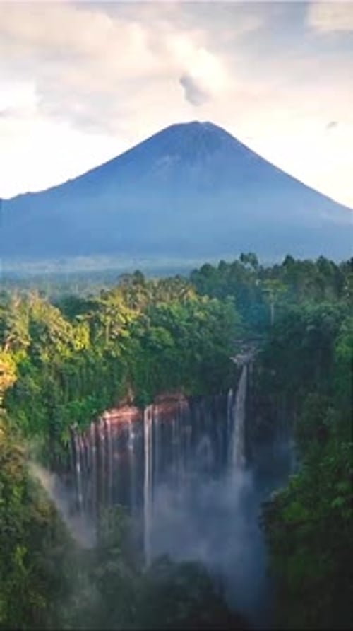 Majestic Volcano with Waterfall and Tropical Forest Landscape