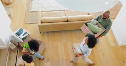Top view, boxes and family with happiness, homeowner and excited with mortgage