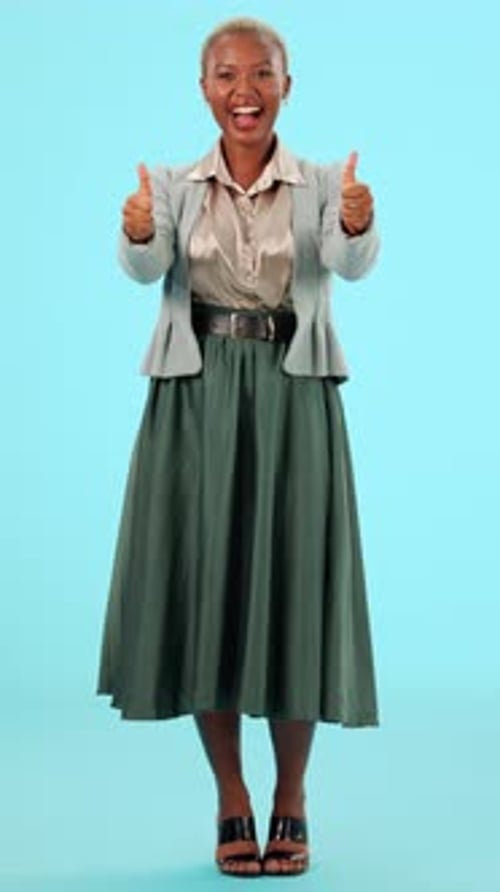 Smiling Woman Giving Thumbs Up, Standing Full Shot