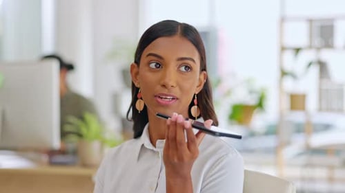 Woman Talking on Smartphone in Modern Office