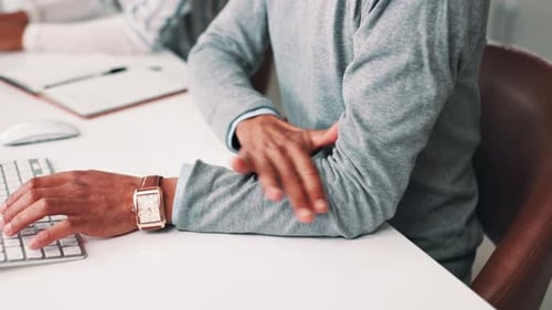 Businessman, arm pain and injury with strain in stress, joint ache or inflammation at office