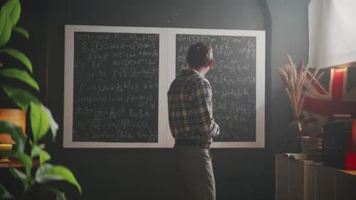 Scientist contemplates complex mathematical equations on a blackboard in his study.