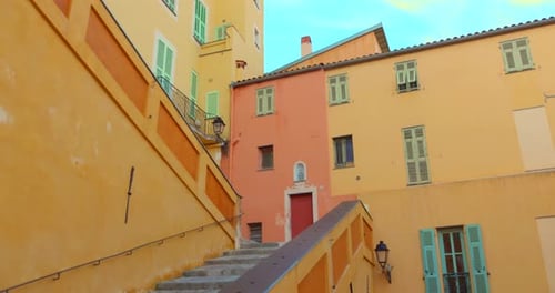 Vibrant color houses and stairway in the old town of Menton, France