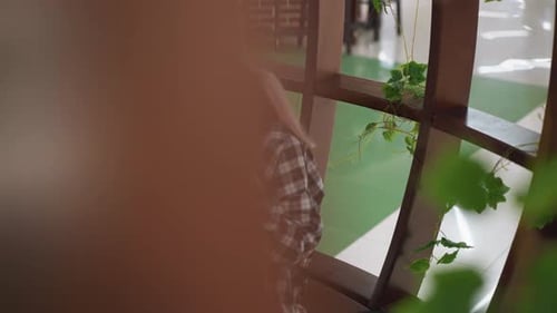 Teen Applying Makeup with Sponge at Table
