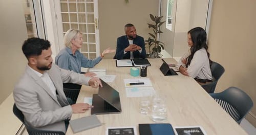 Business people, meeting and documents in boardroom for group discussion