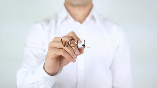 Man Writing Hello on Transparent Surface