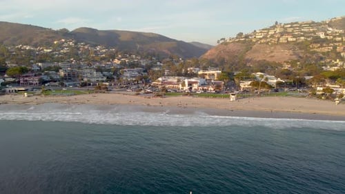 Downtown Laguna Beach, at Sunset. Orange County, Southern California Coast, USA. Drone View of Ocean