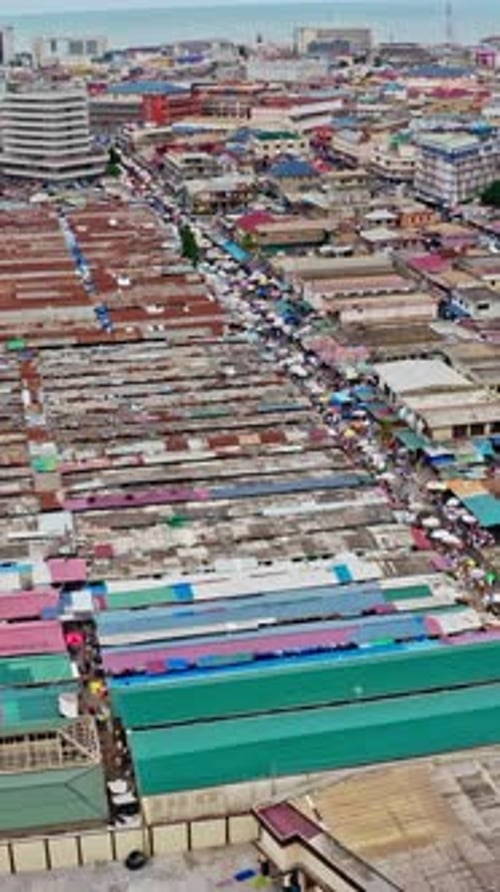 Explore the vibrant markets of Accra from a vertical perspective