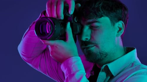 Backstage Photographer in Studio Shooting with Camera