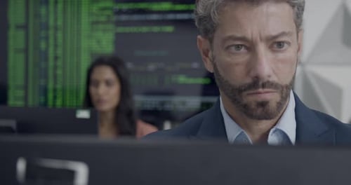 Business People Working on Computer in Cyber security Office