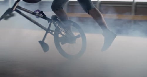 Cyclist Performing BMX Stunt in an Urban Setting