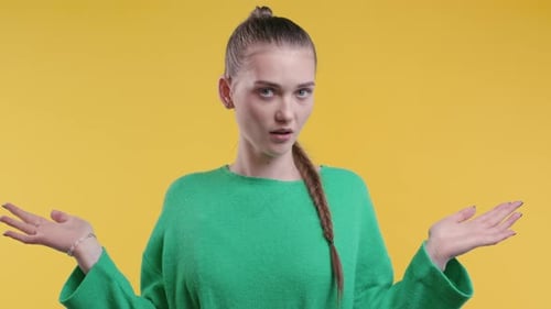 Confused Pretty Woman Shoulders Up Can't Help Makes Gesture of I Dont Know