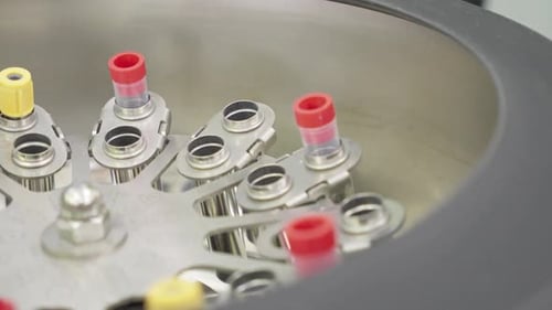 Medicine and Science View of a Blood Test Tubes in a Medical Lab Rotary Mixer Medical Equipment