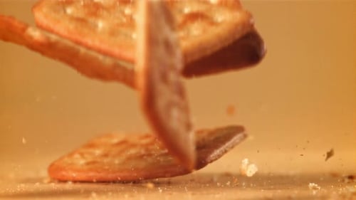 Crackers Falling in Slow Motion Close Up